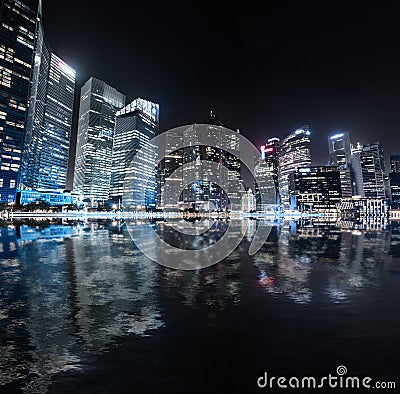 Singapore skyline night panorama. Modern urban city view Stock Photo