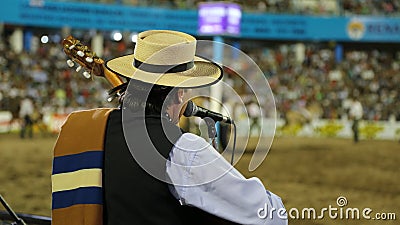 Singer. Payer. Feast of dressage and Argentine folklore. Festival of Jesus Maria in Cordoba, Argentina. Horse taming and folk mus Editorial Stock Photo