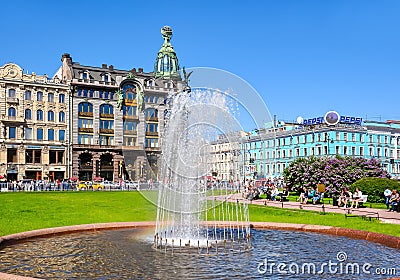 Singer Zinger House on Nevsky prospect and fountain on Kazan square, St. Petersburg, Russia Editorial Stock Photo