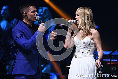 Singers Stas Piekha and Valeria performs on stage during the Viktor Drobysh 50th year birthday concert Editorial Stock Photo