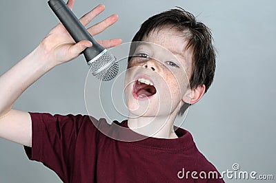 Singing boy Stock Photo