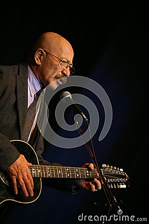 Singing performer author, poet, singer, musician, actor, guitarist and composer Alexander Rosenbaum. Editorial Stock Photo