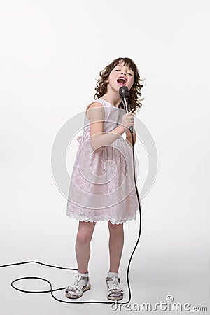 Singing young princess with opened mouth Stock Photo