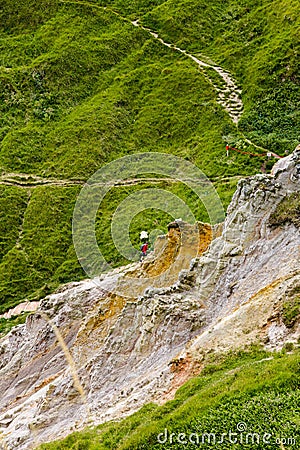 Single alone man hiking in Dorset cliffs Stock Photo