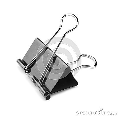 A single binder peg office, isolated on a white background. The black and metallic paper clip. Clerical pins for papers. Stock Photo