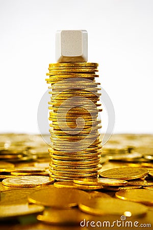 Single blank block over gold coins Stock Photo