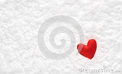 Single bright red heart in soft white snowy ice texture. Valentine`s Day or other romantic holiday wallpaper Stock Photo