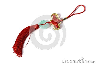 A single bright red oriental knot ornaments on display white backdrop Stock Photo