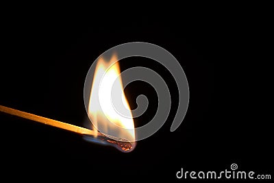 Single burning match Stock Photo