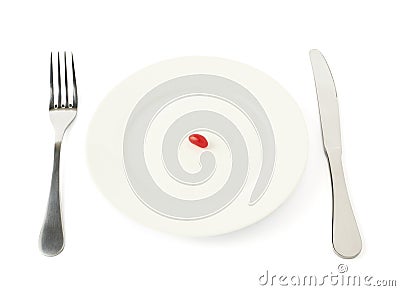 Single candy in a plate isolated Stock Photo