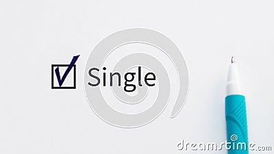 Single - checkbox with a tick on white paper with blue pen. Checklist concept. Stock Photo