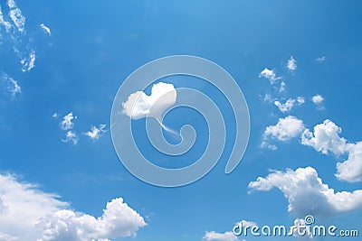 Single clouds heart shape design on vast bright blue sky summer background Stock Photo