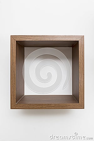 Single empty square shape shelf on white Stock Photo