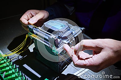 Single fiber fusion splicer welding technology work Stock Photo