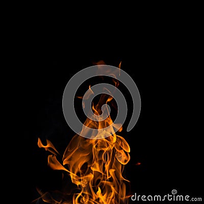 Single fire flame on black background Stock Photo