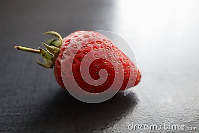 Single frozen strawberry Stock Photo