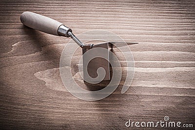 Single hand angle former with wooden handle Stock Photo