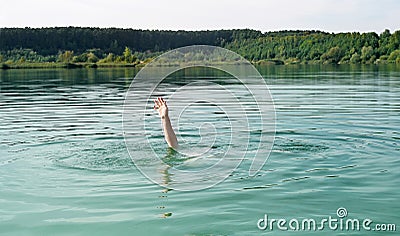 Single hand of drowning man in water asking for help Stock Photo