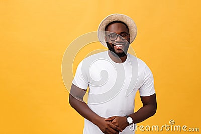 Single handsome muscular Black man with shaved head, folded arms and cheerful expression Stock Photo