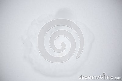 Single Human Footprint in the Snow Stock Photo