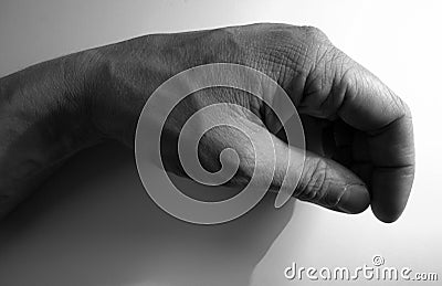 Single isolated human Hand with dramatic shadow Stock Photo