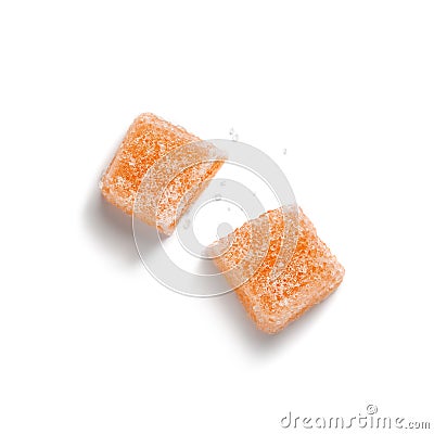 Single marmalade candy sliced into two parts with sugar Stock Photo