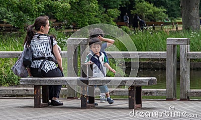 Single Mother With Children, Yoyogi Park, Tokyo, Japan Editorial Stock Photo