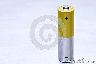 Single Old Alkaline Battery Stock Photo