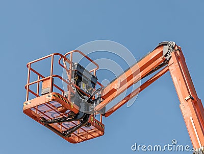 Single Orange Cherry Picker Stock Photo