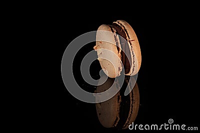 single peanut macaron with chocolate filling Stock Photo