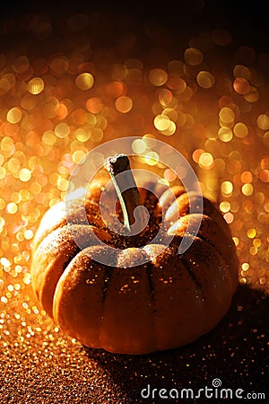 Single pumpkin on orange background Stock Photo