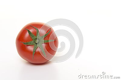 Single real tomatoe seen at its top isolated on a white background Stock Photo