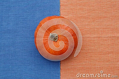 Single Round Pumpkin View from Above on Split Halftone Background with copy space Stock Photo