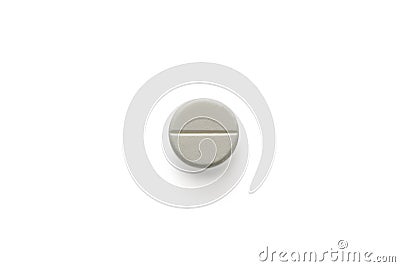 Single round white pill on white isolated background with clipping path and copy space. Medical and clinical concept. Close Up Stock Photo
