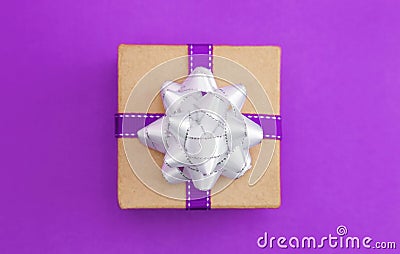 Single Simple Wrapped Present on a Matching Background Stock Photo