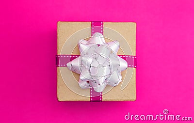 Single Simple Wrapped Present on a Matching Background Stock Photo