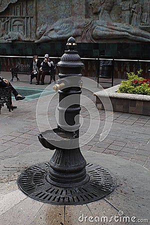 Single and small old water fountain in Leon, Guanajuato Editorial Stock Photo