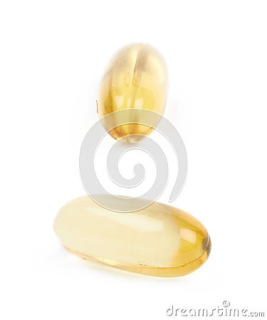 Single softgel pill isolated Stock Photo