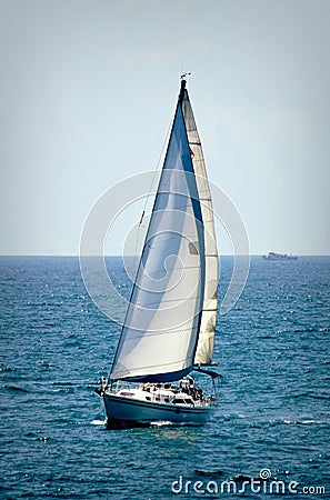 Single tall sailboat at sea. Closeup. Stock Photo
