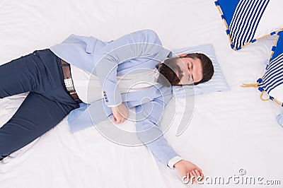 Single to mingle. Single man sleep in formalwear. Bearded man lying in bed alone. Wedding guest. Bachelor or bridegroom Stock Photo
