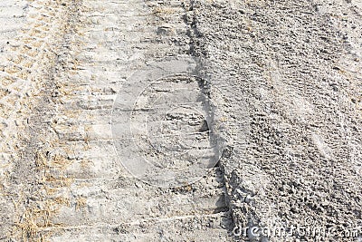 Single Vertical Bull Dozer Track on Road Construction Stock Photo