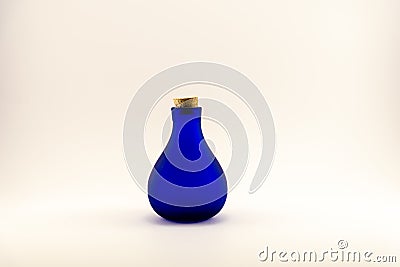 Single vintage blue bottle with cork Stock Photo