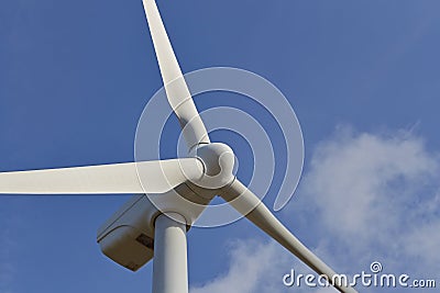 Single windmill for renewable electric energy production Stock Photo