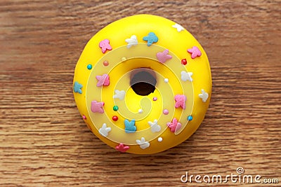 Single yellow donut Stock Photo