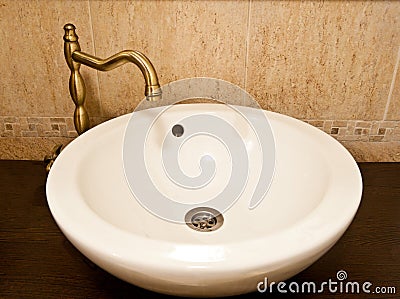 Ceramic sink inside bathroom Stock Photo
