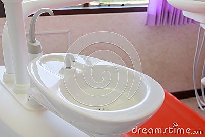 Sink medical equipment dentist Close up, ceramic spittoon and water filler in Clinic Stock Photo