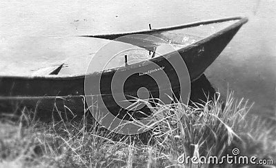 sinking wedding boat in black and white as a metaphor for a broken marriage Stock Photo