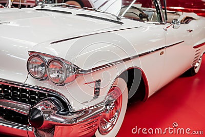 SINSHEIM, GERMANY - OCTOBER 16, 2018: Technik Museum. Beautiful retro automobile parked indoors at red tile Editorial Stock Photo