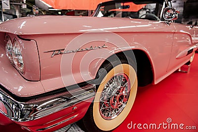 SINSHEIM, GERMANY - OCTOBER 16, 2018: Technik Museum. Pink cabriolet on special stand. Retro style deign Editorial Stock Photo