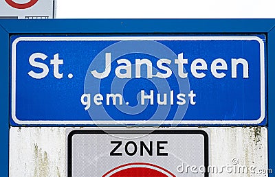 Sint-Jansteen, Zeeland, The Netherlands - Blue road sign of the village of Saint Jansteen, municipality of Hulst Editorial Stock Photo
